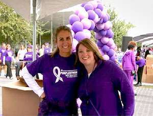 PurpleStride Chair Sonya Martin (right) and Team Captain Katie Bloom celebrate the results of their efforts to organize the 2014 PurpleStride Dallas - Fort Worth.