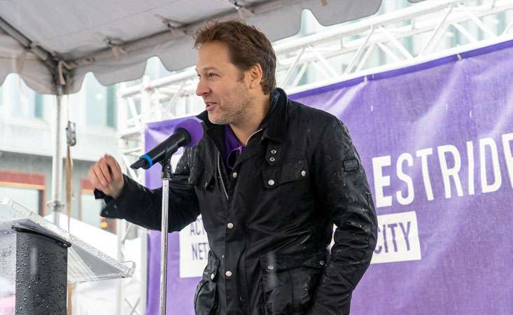 Nick Kenner, founder and CEO of Just Salad, speaks at PanCAN PurpleStride New York City in 2023.