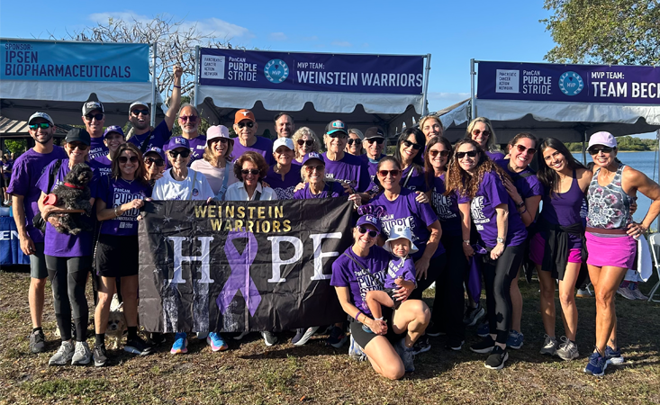Feature image More than 25 members of PanCAN PurpleStride Team Weinstein Warriors posing for a group pic.