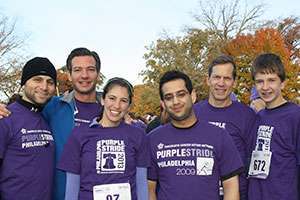 Dr. Vonderheide (second from right) and his son (far right) and fellow members of Abramson Cancer Center at PurpleStride Philadelphia 2013.