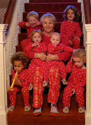 “Koko” sitting with most of her grandchildren by her side.