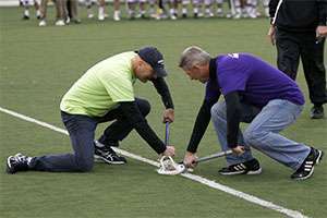 Two cancer survivors (Jerry McGee is on the right) were honored before the match started.