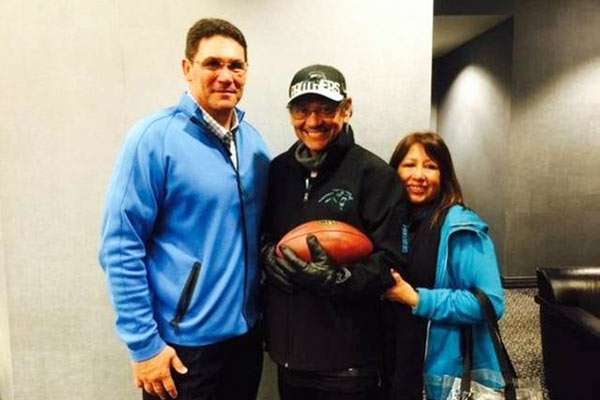 Ron Rivera with Mickey and Mickey's wife.