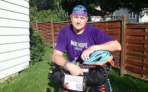 Robert with his bike. He is riding to fundraise for pancreatic cancer.