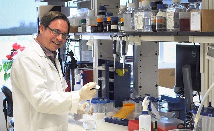Michael Curran, PhD, in his science lab for pancreatic cancer research.