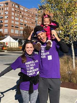 Team captain with her husband and daughter at PurpleStride walk to end pancreatic cancer 