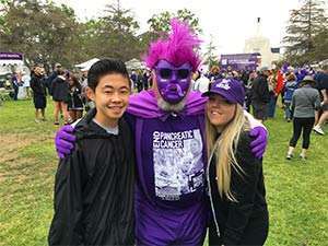 Teen fundraises with other striders in costume at PurpleStride walk to end pancreatic cancer