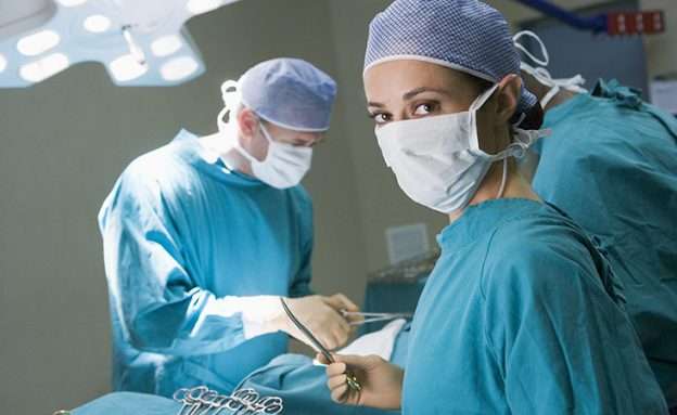 Feature image Surgeons prepare to operate on a pancreatic cancer patient who received prior chemotherapy