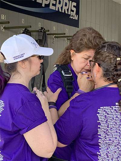 Woman who lost sister to pancreatic cancer has a quiet moment before skydiving.