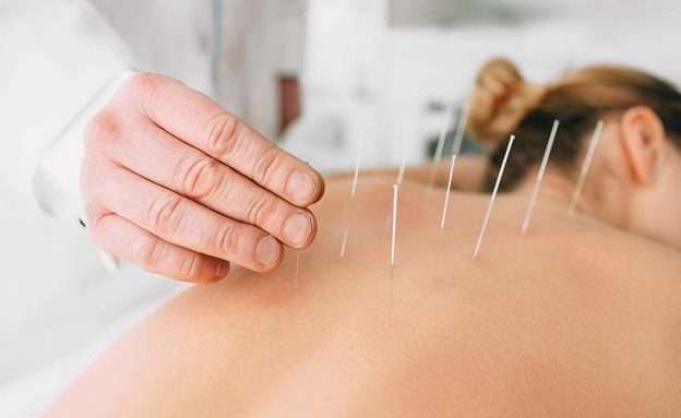 Feature image Pancreatic cancer patient attends an acupuncture session to relieve nausea and pain