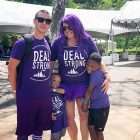 Young pancreatic cancer survivor participates in fundraising walk with his wife and two sons