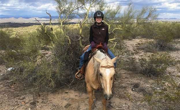 Pancreatic cancer patient on horseback in Arizona one year after her diagnosis