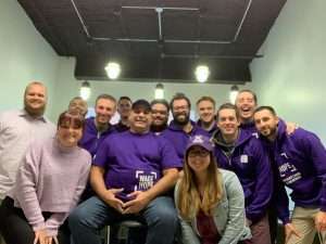 Pancreatic cancer survivor and coworkers wear purple to support Pancreatic Cancer Action Network
