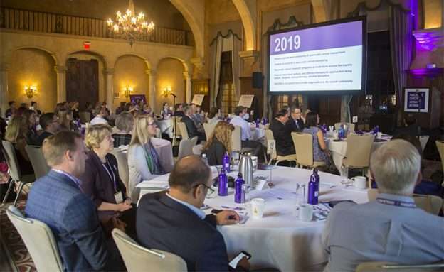 Feature image Large group of pancreatic cancer researchers and clinicians learn about updates in the field