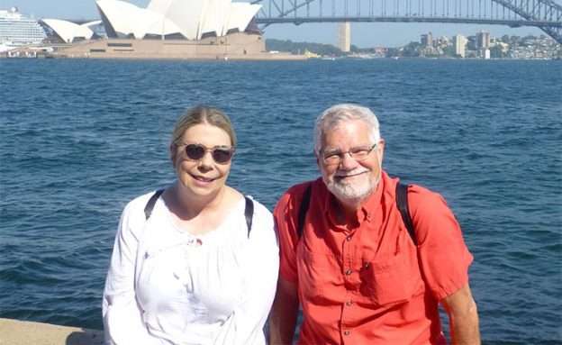 Feature image Pancreatic cancer survivor and his partner in front of the Sydney Opera House in Australia