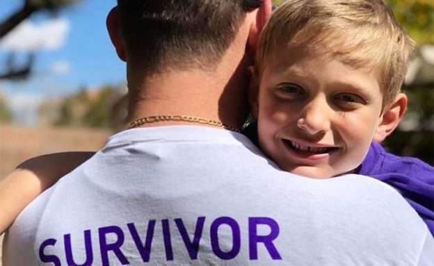 Feature image Pancreatic cancer survivor with young son at PurpleStride Las Vegas fundraiser