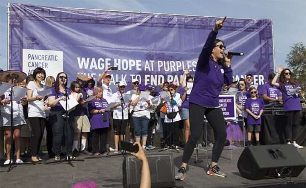 Feature image Erin Willett performs “Hope’s Alive” at PurpleStride pancreatic cancer fundraiser in L.A.