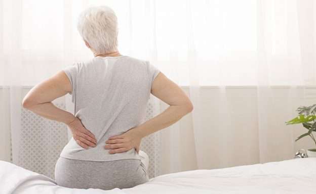 Feature image Woman with pancreatic cancer has back pain caused by her tumor