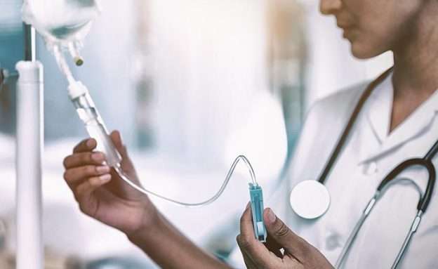 Feature image Pancreatic cancer patient receives an infusion of an experimental immunotherapy