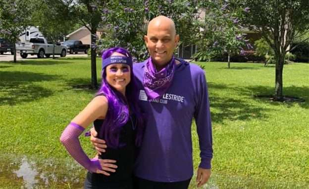 Feature image Pancreatic cancer survivor and his wife decked out in purple at home for virtual event