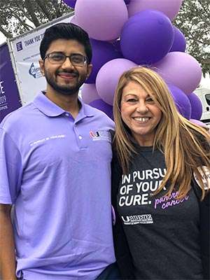 Dr. Jashodeep Datta, Assistant Professor of Surgery at University of Miami School of Medicine, Sylvester Comprehensive Cancer Center, shown with pancreatic cancer survivor Camille Moses at PanCAN's PurpleStride Broward-Palm Beach