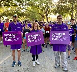 Sylvester Comprehensive Cancer Center staff shows their support for pancreatic cancer patients at PanCAN's PurpleStride Broward-Palm Beach.