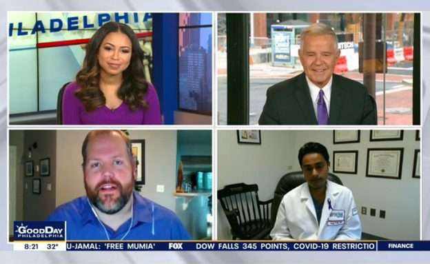 Feature image Pancreatic cancer survivor interviewed by media wearing purple for pancreatic cancer awareness