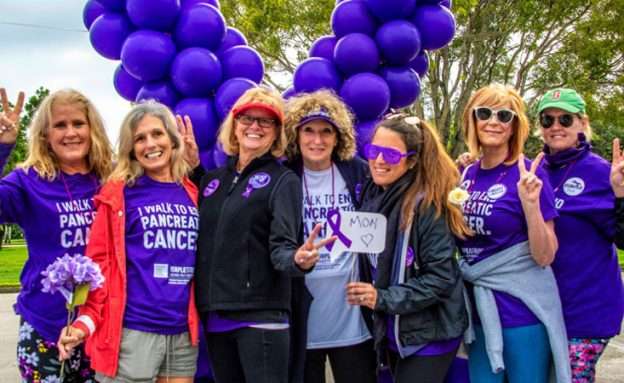 Feature image Pancreatic cancer survivor Reesa Levy at PanCAN’s PurpleStride (center)