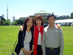 Pancreatic cancer researcher's parents join her PhD graduation celebration 
