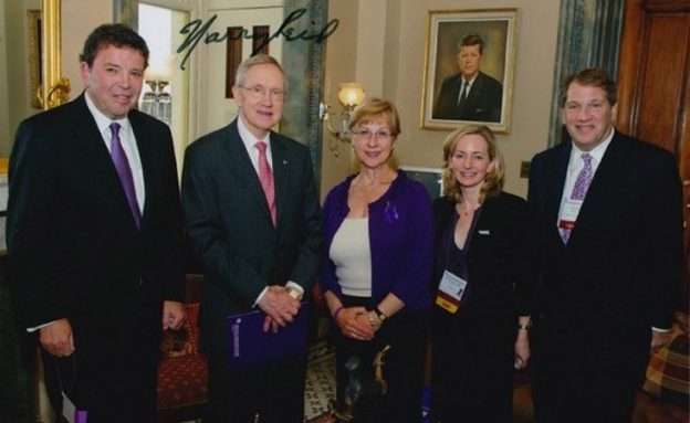 Feature image Sen. Harry Reid with PanCAN advocates, President and CEO Julie Fleshman and Peter Kovler
