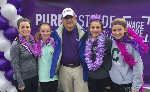 Feature image Ken Cunzeman, PanCAN volunteer in Maryland, with his granddaughters at PanCAN PurpleStride
