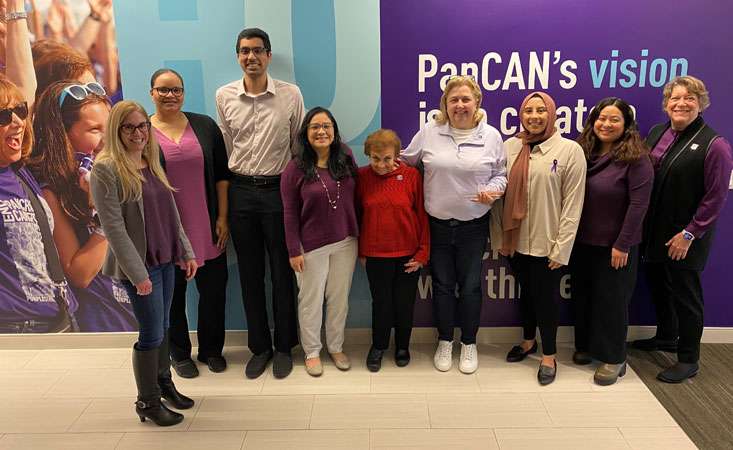 Feature image Lisa Kulok, Carol’s best friend Nancy, and proud members of the PanCAN Patient Services team standing and posing for a picture.