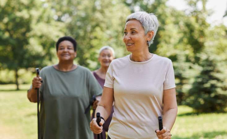 Feature image Three women exercising outdoors