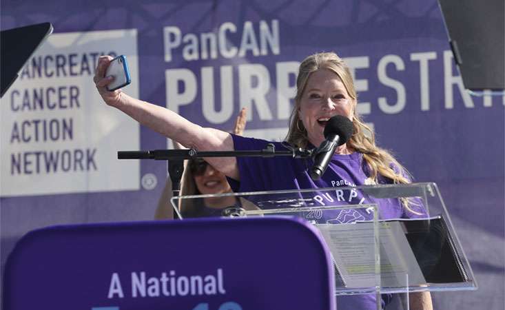 Feature image Lisa Niemi Swayze on stage at PanCAN PurpleStride 2024