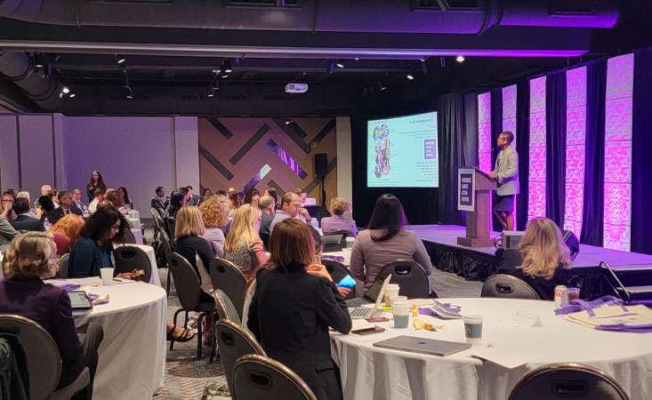 Feature image PanCAN Career Development Award recipient Janielle Maynard, PhD, presents her project at the 2024 PanCAN Scientific Summit.