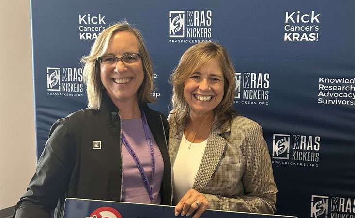 Feature image PanCAN Chief Scientific and Medical Officer Anna Berkenblit, MD, MMSc (left) with fellow advocacy organization representative Terri Conneran, founder of the KRAS Kickers and a survivor of lung cancer with a KRAS mutation.