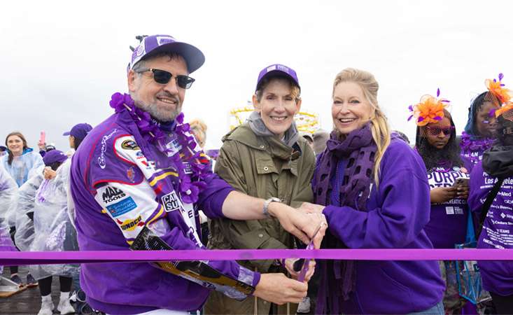 Feature image Celebrities Kitty Swink and Lisa Niemi Swayze cutting the ribbon at PanCAN PurpleStride 2025 in Santa Monica, CA