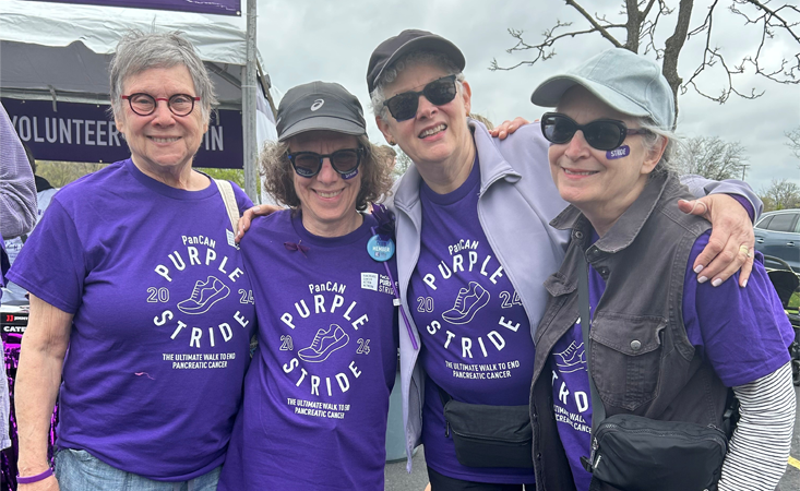 Feature image Four adult women standing together at PanCAN PurpleStride Chicago 2024